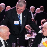 Tom Haas greeting Raleigh Finkelstein and Don Lubbers